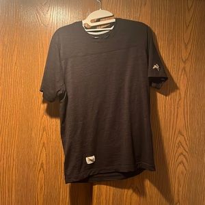 Tracksmith Black Harrier short sleeved. Men’s Medium